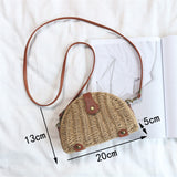 Beige semicircular straw shoulder bag for summer travel and beach style