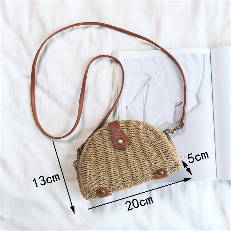 Beige semicircular straw shoulder bag for summer travel and beach style
