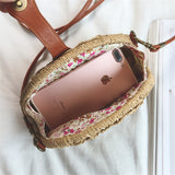 Beige semicircular straw shoulder bag for summer travel and beach style