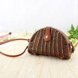 Brown woven mini crossbody straw bag with semicircle shape – holiday fashion
