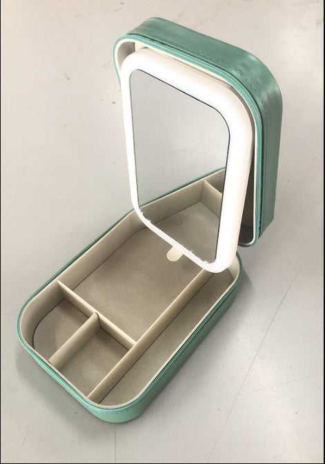 Green cosmetics organiser with mirror and touch lighting – travel-friendly and stylish