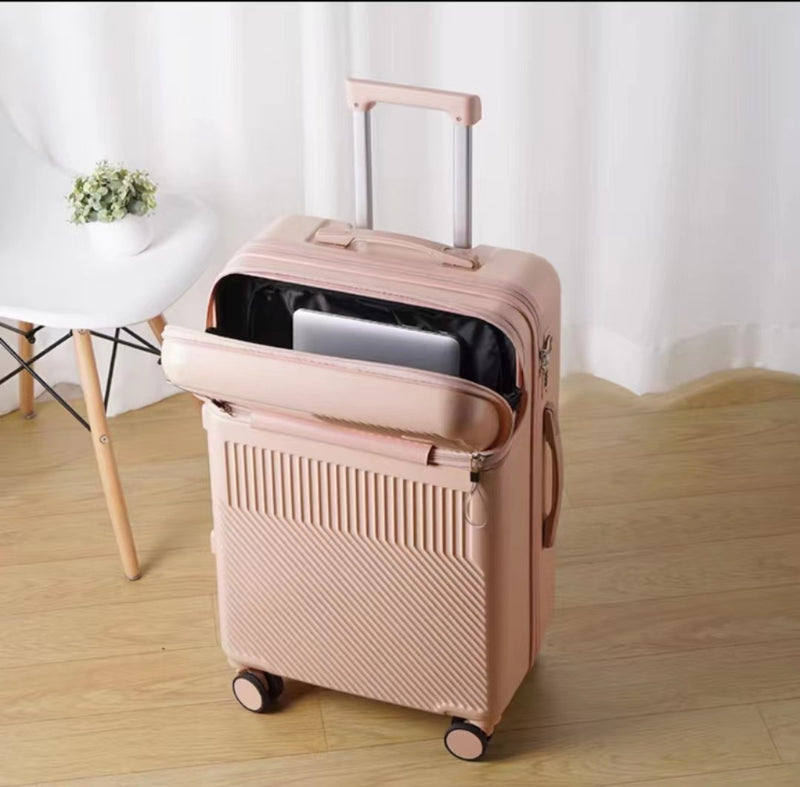 Pink women’s hand luggage with password protection, spinner wheels and sleek design