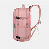 Pink women’s large capacity travel backpack with laptop sleeve and wet/dry compartments