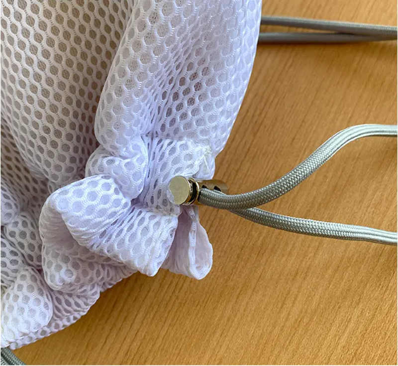 White lightweight mesh shoulder bag for holidays and casual outfits