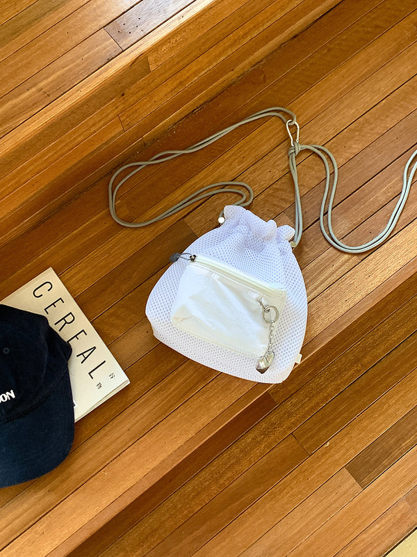 White lightweight mesh shoulder bag for holidays and casual outfits