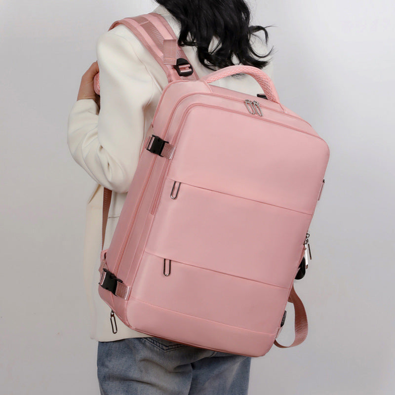 women’s large capacity travel backpack with laptop sleeve and wet/dry compartments